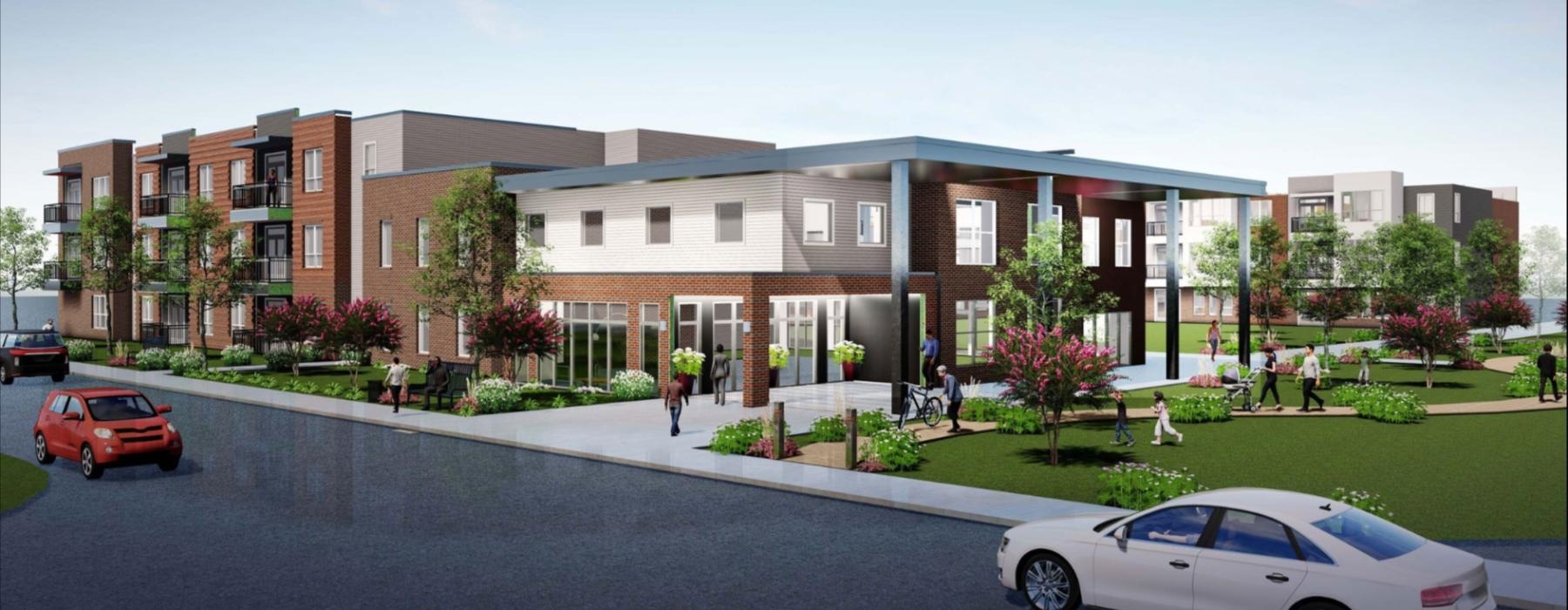 a building with a parking lot and cars in front